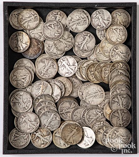 Eighty-seven Walking Liberty silver half dollars