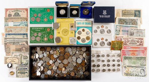 Large group of foreign coins and currency