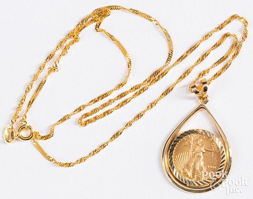 .1 ozt. fine gold coin mounted in a 14K necklace