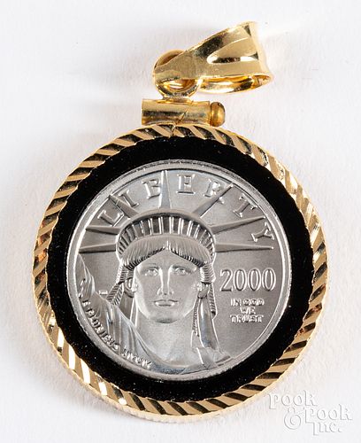 .1 ozt. fine platinum coin with 14K gold pendant