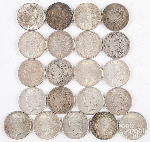 Twenty-one silver dollars