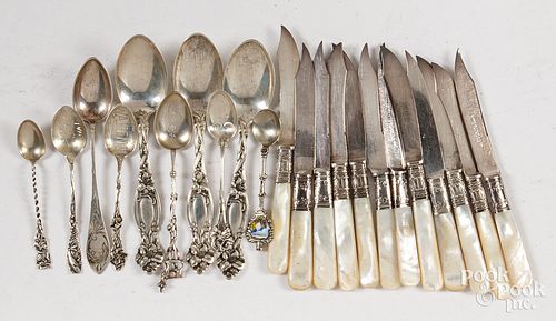 Silver spoons with mother of pearl knives