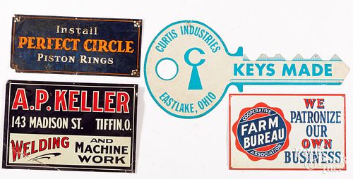 Four tin advertising signs, 20th c.