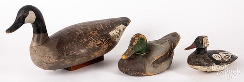 Three carved and painted decoys