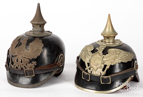 Two German WWI and earlier leather spike helmets