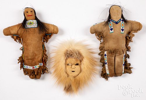 Two Native American Indian beaded hide dolls, etc.