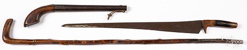 Gun barrel, cane, and short sword