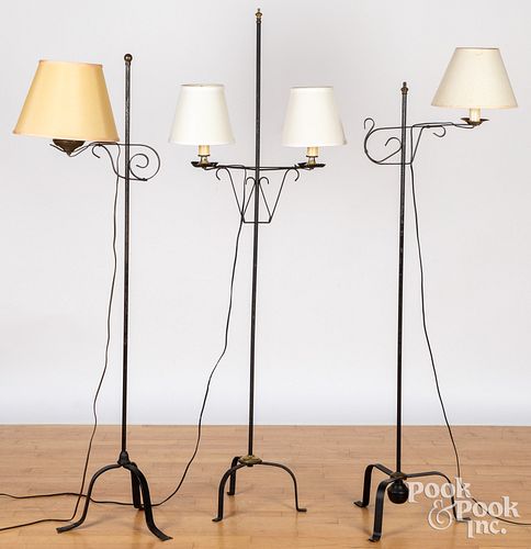 Three iron floor lamps
