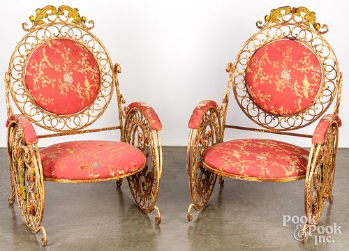 Pair of painted iron armchairs