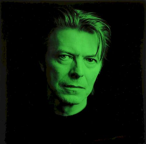 David Bowie: A signed limited edition print, signed in pencil in an unknown hand, numbered 48/250, framed, 21 x 21 inches
