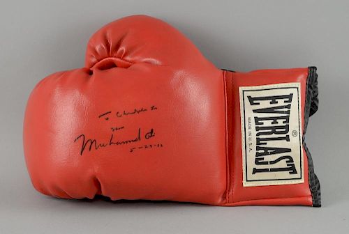 Muhammad Ali - Everlast Boxing glove, signed 'To Christopher From Muhammad Ali 5-29-92'.Provenance: From the Estate of Sir Ch