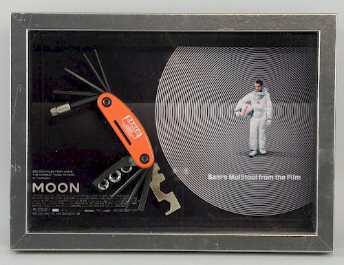 Moon (2009) Multi Task tool used in the film by Sam. Plastic body with metal attachments. This movie prop can be seen in Sam'