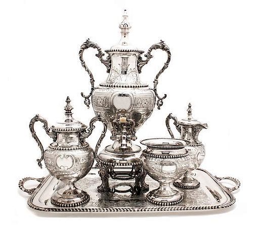 A Five Piece Silver-Plate Tea Service, Meriden Brita 1835, Height of tallest 19 1/4 inches.