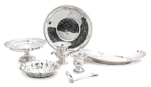 A Collection of Seven Sterling Silver Serving Articles, Diameter of largest: 10 inches.