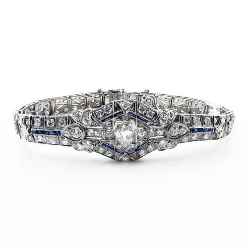 Art Deco Approx. 7.30 Carat TW Diamond, Sapphire and Platinum Belly Bracelet set in the center with a 1.0 carat Shield Shape 