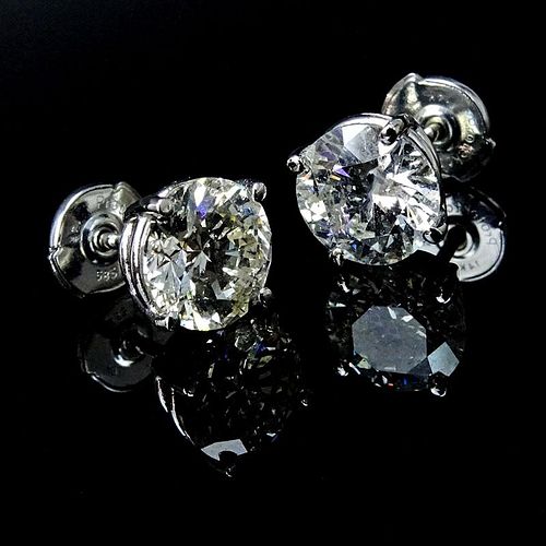 Approx. 3.24 Carat TW Round Brilliant Cut Diamond and 14 Karat White Gold Stud Earrings.