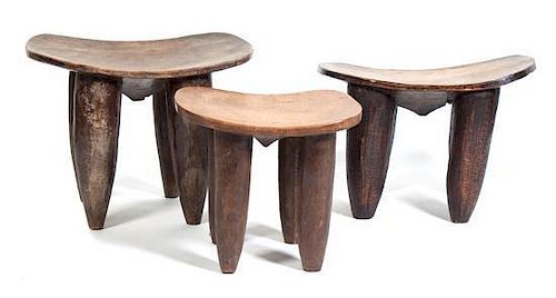 Three African Carved Wood Senufo Stools, Height of largest 21 1/4 x width 27 x depth 20 inches.