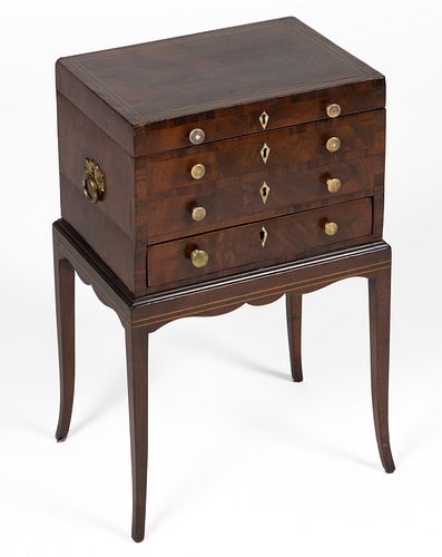 REGENCY MAHOGANY AND SATINWOOD INLAID MINIATURE CHEST ON STAND