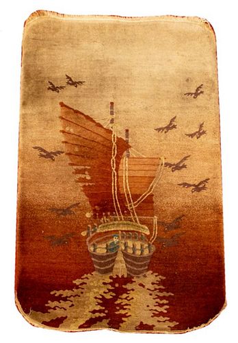 Chinese pictorial carpet depicting a sail ship with a figure and birds flying above. 5' H x 3' W.