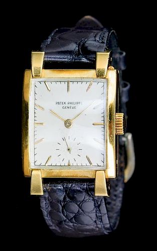 An 18 Karat Yellow Gold Ref. 2427 Wristwatch, Patek Philippe, Circa 1950,