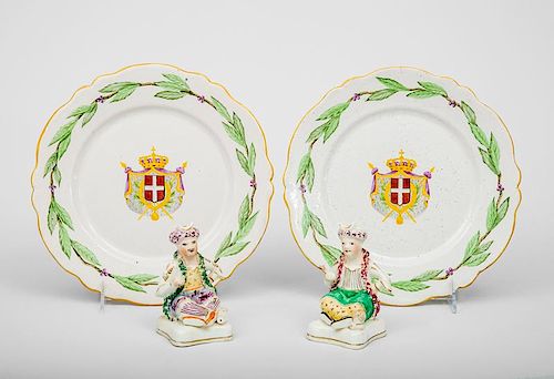 Pair of Porcelain Figures of Pachas Seated on Pillows and a Pair of Pottery Armorial Plates