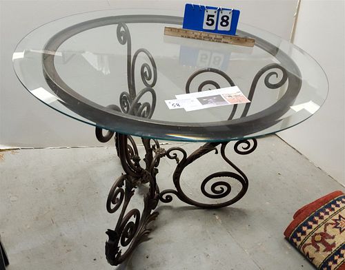 WROUGHT BASE TABLE W/BEVELLED GLASS TOP MADE BY ARROWSMITH FORGE PER PIERRE DEUX 28-1/2"H X 40"DIAM