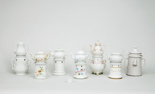 Group of Six Continental Pottery Individual Teapots and Covers and Seven Warmers