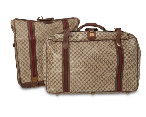 Two vintage Gucci Monogram luggage cases