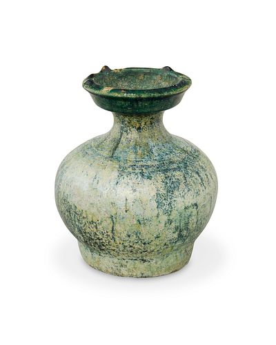 A Chinese Han Dynasty green glazed earthenware vase