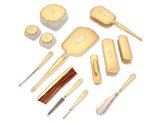 An International 14k gold vanity set