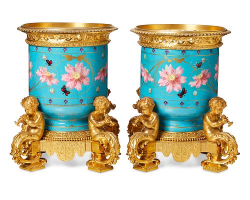 A pair of French Victor Paillard porcelain jardiniEres
