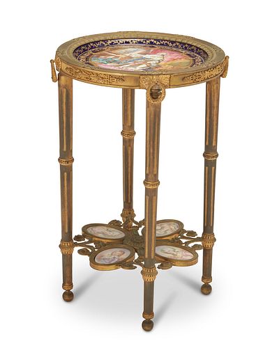 A French Louis XVI-style gilt-bronze and porcelain gueridon table