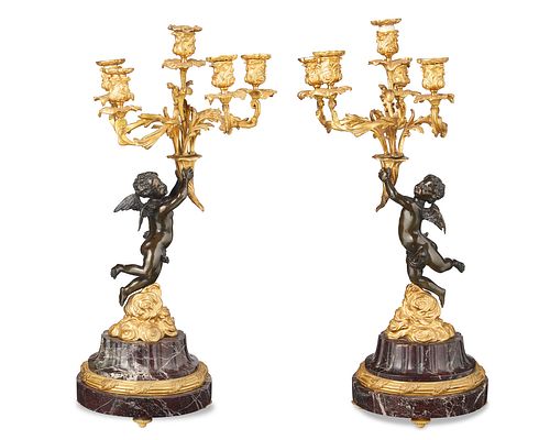 A pair of Louis XV-style gilt-bronze and marble candelabra