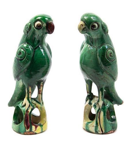 A Pair of Chinese Ceramic Models of Parrots, Height 8 inches.