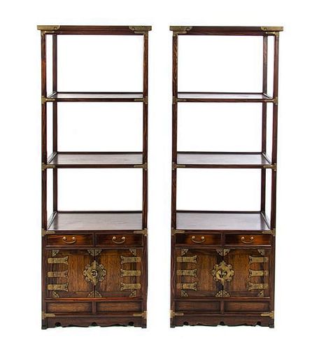 A Pair of Chinese Style Brass Banded Etageres, Height 64 1/4 x width 23 1/2 x depth 16 1/4 inches.