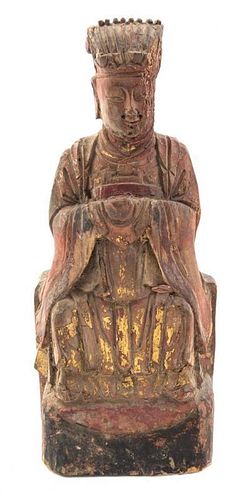 A Chinese Carved Wood Figure, Height 10 3/4 inches.