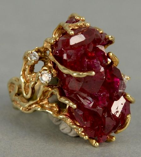 14K gold custom ladies ring, set with uncut ruby cluster and four small diamonds, marked inside: Andrew. 
total weight 20.7 g