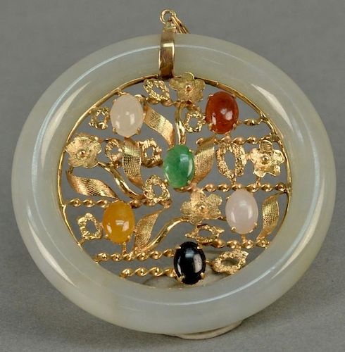 White jade round pendant, middle set with 14K gold and six colored hardstones.  dia. 1 7/8in.