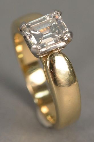 14K gold ring with emerald cut diamond, approximately 2 cts.