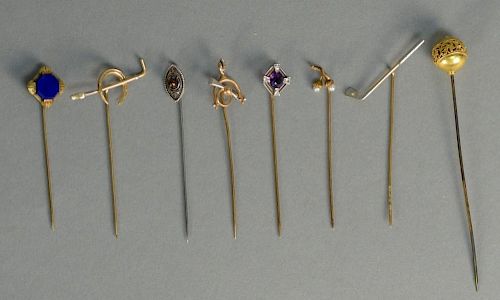 Eight various stick-pins most marked 14K.