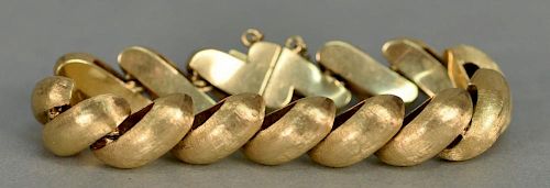 14K brushed gold bracelet marked GVG. 
52.7 grams