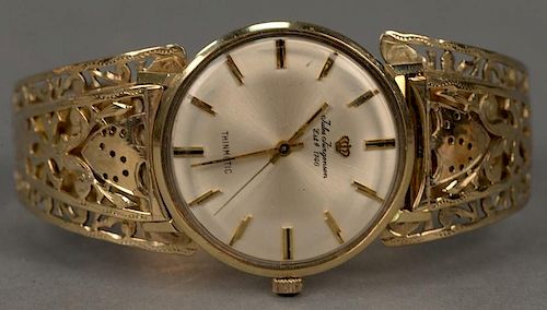 Jules Jurgensen 14K gold wristwatch with 14K open work bracelet, in original box.