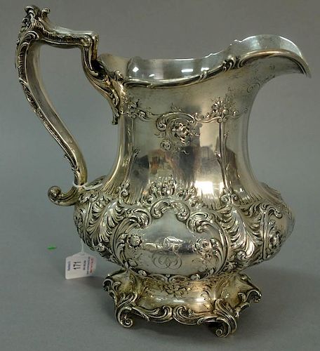 Gorham sterling silver repousse pitcher with handle and overall foliate and flower design. 
ht. 10in. 
32.9 t oz.