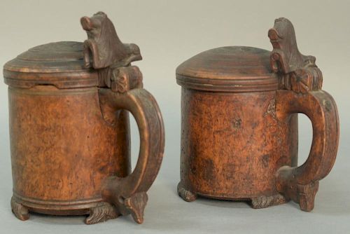 Two Scandinavian burlwood tankards 18th/19th century, each having hinged covers with carved lion thumb piece over handle atta