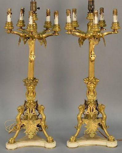 Pair of Napoleon III patinated bronze five light candelabra by Barbedienne, each having five scroll branches terminating with