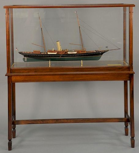 Corsair ship model in mahogany and glass case on mahogany stand, marked on plaque: American Steam Yacht "Corsair" of 1899 own