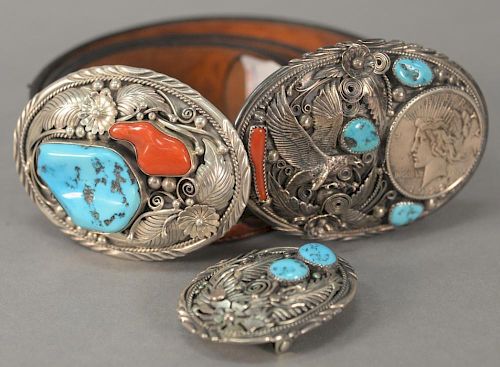 Three vintage Native American Indian sterling silver turquoise and coral belt buckles, one with 1922 silver dollar and flying