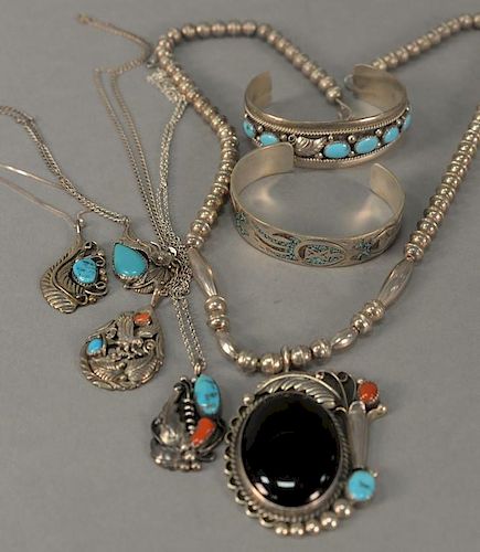 Group of seven vintage Native American or Southwestern Indian sterling jewelry pieces to include two bracelets with turquoise