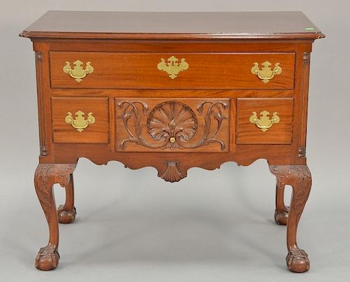Margolis mahogany lowboy having rectangular top with notched corners over one long drawer over three short drawers, center dr