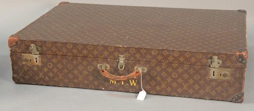 Louis Vuitton monogram canvas suitcase, hard shell with fitted tray interior, paper label on inside: Louis Vuitton 834647, Pa